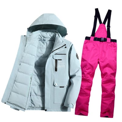 Šiltas moterų slidinėjimo kostiumas žieminė slidinėjimo striukė ir kelnės vandeniui nepralaidūs kvėpuojantys slidinėjimo ir snieglenčių kostiumai lauko sniego kostiumai