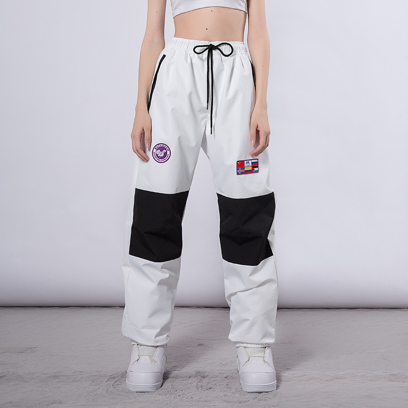 Šviesą atspindinčios slidinėjimo kelnės vyrams ir moterims žiemos snieglenčių alpinizmo stovyklavietėje storėjančios šiltos, atsparios vėjui ir vandeniui atsparios sniego slidinėjimo kelnės