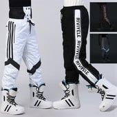 2022 m. slidinėjimo kelnės Vyriškos sniego kelnės moteriškos vėjui atsparios žiemos lauko kombinezonai, snieglenčių kelnės, vandeniui atsparūs terminiai moteriški slidinėjimo kombinezonai