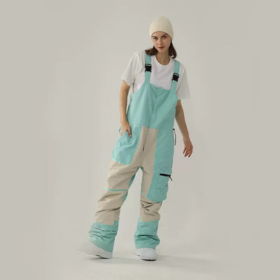 Nauji vientisos slidinėjimo kelnės kombinezonai, atsparūs vėjui, moteriški lauko kostiumai snieglenčių sportui Vyriški kombinezonai, atsparūs vandeniui slidinėjimo kostiumai, laisvi sniego drabužiai