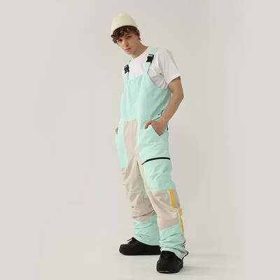 Nauji vientisos slidinėjimo kelnės kombinezonai, atsparūs vėjui, moteriški lauko kostiumai snieglenčių sportui Vyriški kombinezonai, atsparūs vandeniui slidinėjimo kostiumai, laisvi sniego drabužiai