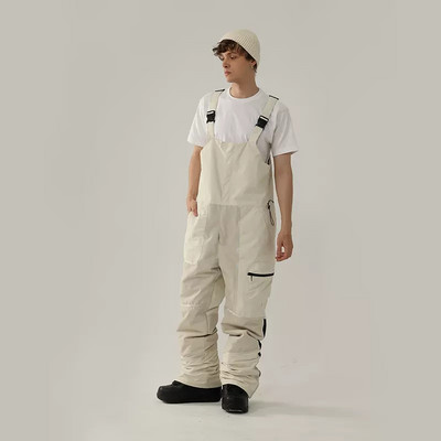 Nauji vientisos slidinėjimo kelnės kombinezonai, atsparūs vėjui, moteriški lauko kostiumai snieglenčių sportui Vyriški kombinezonai, atsparūs vandeniui slidinėjimo kostiumai, laisvi sniego drabužiai