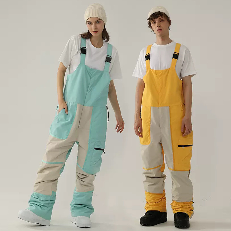 Nauji vientisos slidinėjimo kelnės kombinezonai, atsparūs vėjui, moteriški lauko kostiumai snieglenčių sportui Vyriški kombinezonai, atsparūs vandeniui slidinėjimo kostiumai, laisvi sniego drabužiai