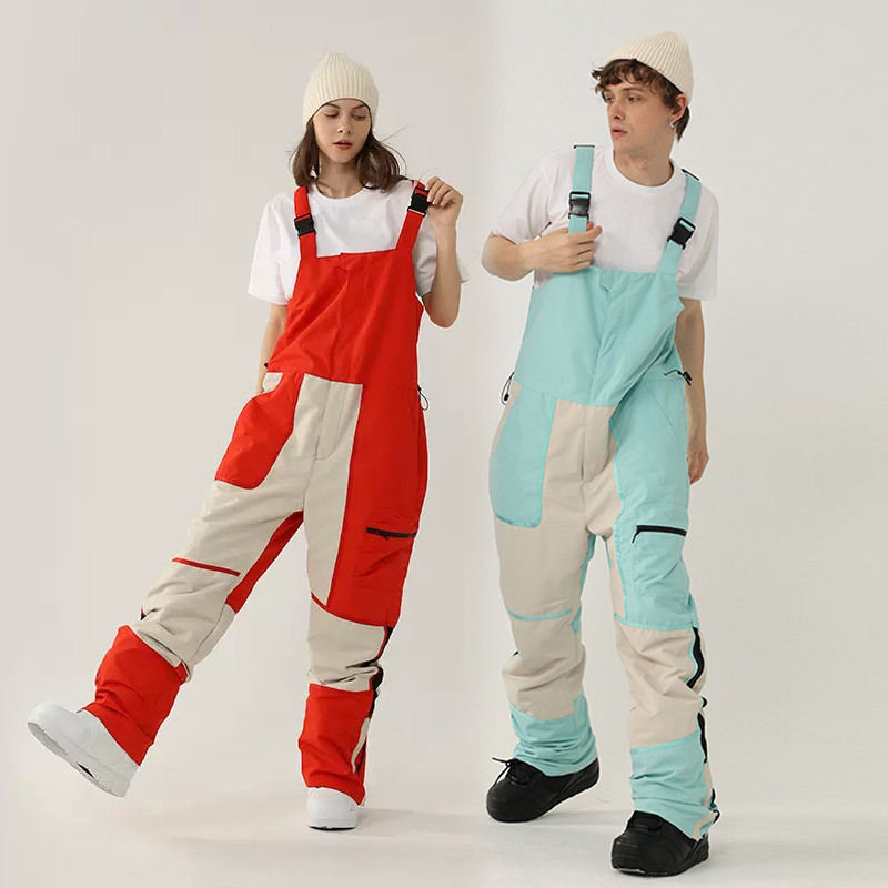 Nauji vientisos slidinėjimo kelnės kombinezonai, atsparūs vėjui, moteriški lauko kostiumai snieglenčių sportui Vyriški kombinezonai, atsparūs vandeniui slidinėjimo kostiumai, laisvi sniego drabužiai