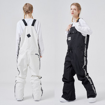 Нови еднокомпонентни ски панталони Дамски външни гащеризони Мъжки ветроустойчиви водоустойчиви панталони за сноуборд Топли снежни панталони плюс памучни ски костюми