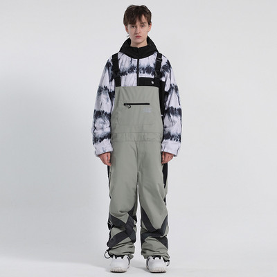 Moteriškos ir vyriškos sniego kelnės žieminės ledo kelnės snieglentininkų drabužiai spalvingi šviečiantys kombinezonai vandeniui atsparūs slidinėjimo kostiumai, seilinukai