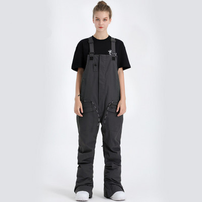 Naujos moteriškos ir vyriškos sniego kelnės Žiemos lauko sportiniai šliaužtinukai ledo kelnės snieglentininkų drabužiai vandeniui atsparūs seilinukai slidinėjimo kostiumai