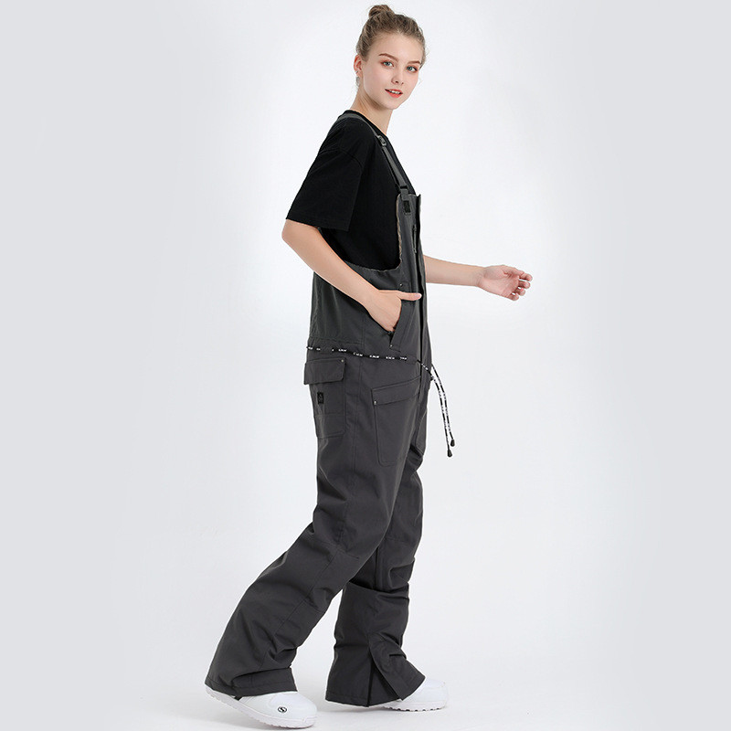 Naujos moteriškos ir vyriškos sniego kelnės Žiemos lauko sportiniai šliaužtinukai ledo kelnės snieglentininkų drabužiai vandeniui atsparūs seilinukai slidinėjimo kostiumai