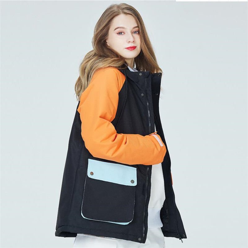 2022 m. Workwear Moteriška slidinėjimo striukė Neperšlampama moteriška kvėpuojanti snieglenčių striukė su didelėmis kišenėmis Žiemos šilto palto slidinėjimo striukės