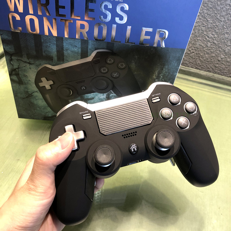 Comerț cu ridicata fără fir Bluetooth Dual Vibration Elite Game Console Controller Joystick Mufă pentru căști încorporată pentru PS4 și PC