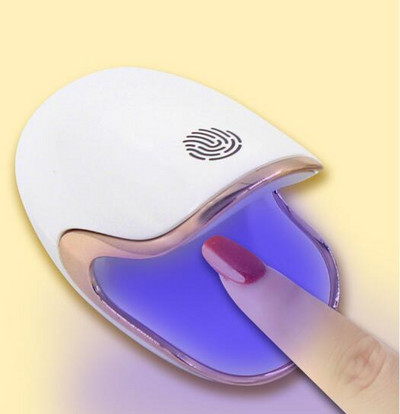 Pārnēsājams mini nagu žāvētājs Touch Type nagu lakas gaisa žāvētājs nagu lakas līmes ventilators Pārnēsājama mājsaimniecības nagu lampa Ātri žūstoša mašīna