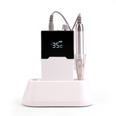 Τρυπάνι λεπτού σώματος Τρυπάνι νυχιών χωρίς ψήκτρες Επαναφορτιζόμενη βάση επιτραπέζιου υπολογιστή 35000RPM Ακανόνιστη λίμα νυχιών ηλεκτρικής μηχανής Ασύρματο