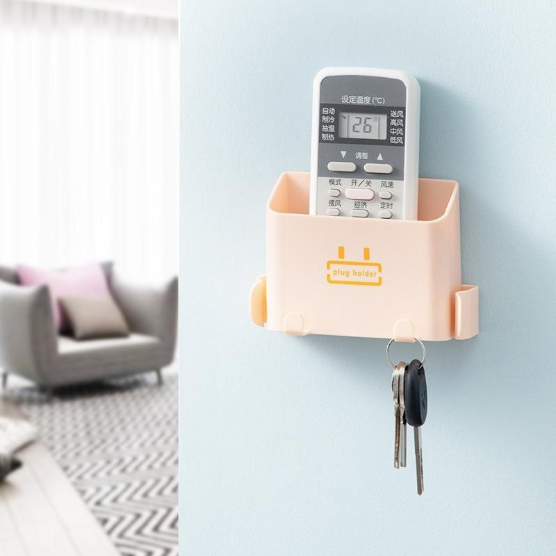 Pie sienas stiprināma organizatora kastīte Mājas biroja perforators Bezmaksas TV tālvadības pults glabāšana Tālruņa kontaktdakša Sienas turētājs uzlādes daudzfunkciju āķi