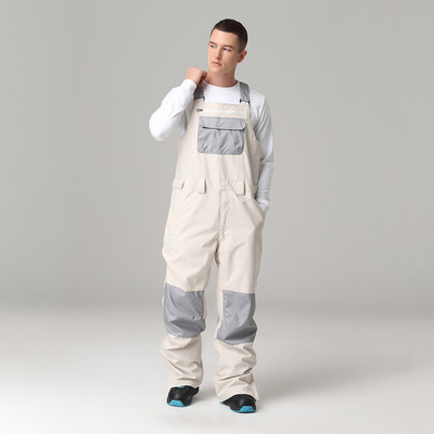 Karštos 2022 m. naujos juostos slidinėjimo kelnės, neperšlampamos nuo vėjo vyriškos ir moteriškos sniego kelnės.