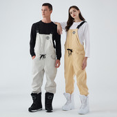 Naujos vienetinės slidinėjimo kelnės Moteriškos vyriškos lauko snieglenčių kelnės Neperpučiamos nuo vėjo ir vandeniui atsparios kombinezonai Slidinėjimo kostiumai Šilti sniego kelnės kombinezonai