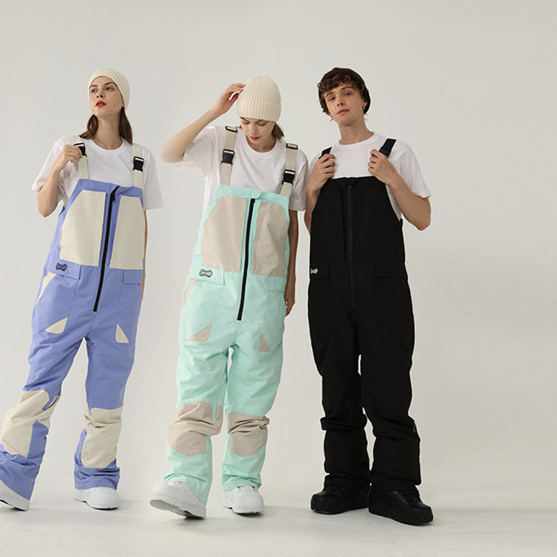 Нов ски гащеризон Дамски мъжки ски панталони от една част Спорт на открито Сноуборд костюм Гащеризон Ветроустойчив водоустойчив снежен костюм Облекло