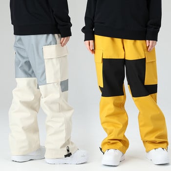 Нови зимни свободни ски панталони Дамски ветроустойчиви водоустойчиви мъжки ски костюми Външни фурнирни панталони Гащеризони Снежни панталони в съответствие с цвета