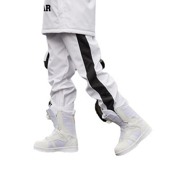 Мъжки и дамски ски панталони Комплект крака Корейски ветроустойчиви водоустойчиви свободни модели Топли плюс кадифени панталони Панталони Бял Черен Розов