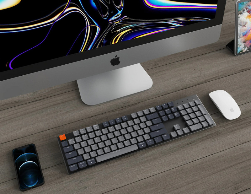 „Keychron K5 E“ itin plona belaidė mechaninė klaviatūra RGB apšvietimas, karštai keičiamas žemo profilio optinis jungiklis, skirtas „Mac Windows“