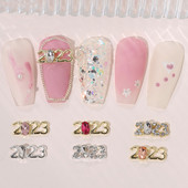 12 komada Nova godina 2023. Nail Art Charms Luksuzni jednostavni 3D cirkon Legura Nokti Ukrasi od nakita Dobavljači za manikuru