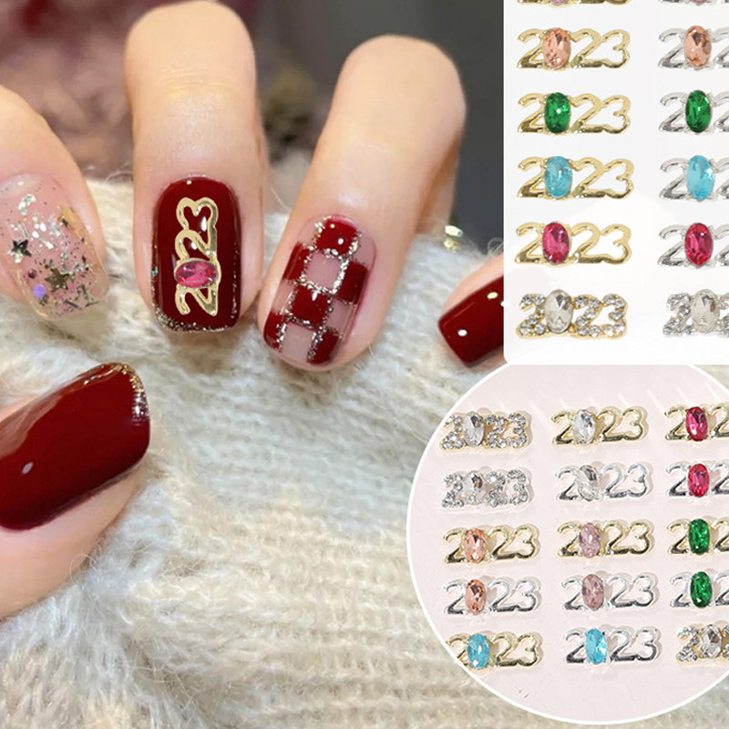 12 komada Nova godina 2023. Nail Art Charms Luksuzni jednostavni 3D cirkon Legura Nokti Ukrasi od nakita Dobavljači za manikuru