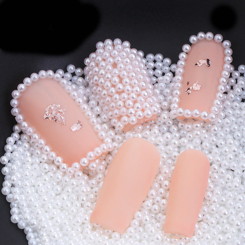 10000db/táska Köröm Kerek Gyöngygyöngy Strasszkő dekoráció Bézs/Fehér 1,5MM, 2MM Pearl Charm 3D ékszer körömművészethez
