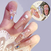 60 vnt. putojančios nagų dailės dekoracijos Butterfly Shell Gėlės forma „Pasidaryk pats“ 3D Permatomos auroros manikiūro priedai