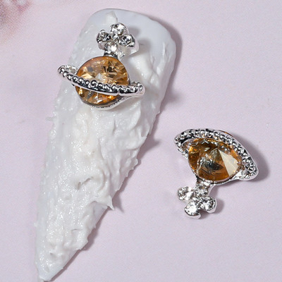 3D Alloy Planet Cross Nail Art Chamrs 10db/tétel Színes Saturn Designs Strasszok Gyémánt Dekorációk Ékszerek Köröm Kiegészítők