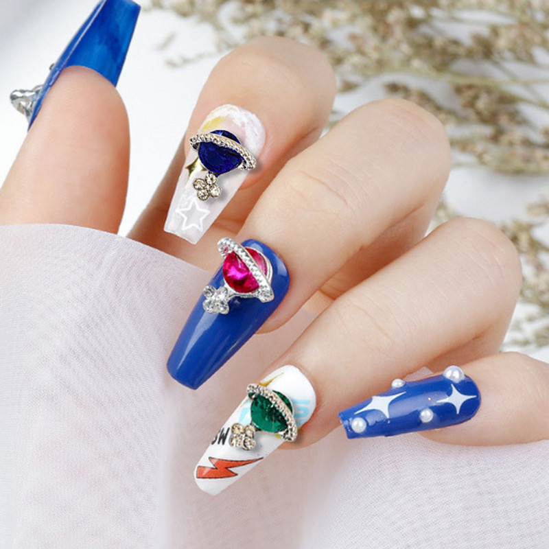3D Alloy Planet Cross Nail Art Chamrs 10db/tétel Színes Saturn Designs Strasszok Gyémánt Dekorációk Ékszerek Köröm Kiegészítők