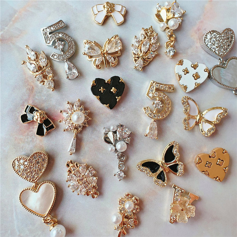 10 komada Love Flower Leptir mašna Legura Nail Art Cirkon Pearl Crystal Metal Manikura Nokti Accesorios Supplies Decorations Charms