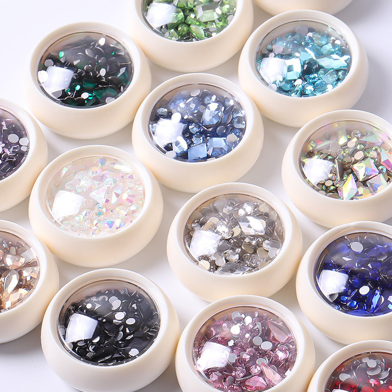 Crystal Nails Art strasszkészlet vegyes méretű hordozható készlet üveg gyémánt díszítések 3D AB lapos drágakövek köröm tervezési kellékek