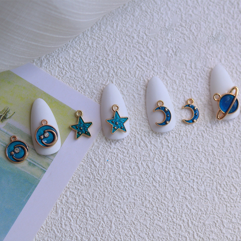 10db Planet Nail Art Ékszer Star Moon Ötvözet Nails Charms Alkatrészek 3D Exquisite Fém Kiegészítők Barkácsolás Kék Manikűr Dekoráció W12