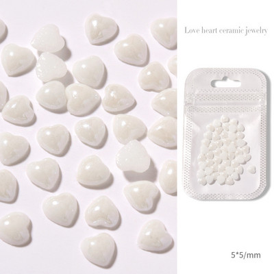 50db őszibarack szív alkatrészek köröm ékszer színes porcelán kerámia szerelem design 3D köröm strassz drágakő fényes dekoráció 5/6 mm