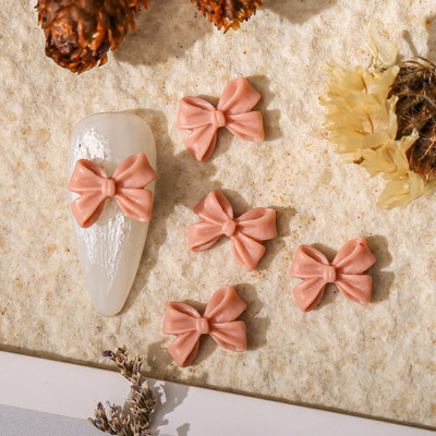 50db Kawaii Bow Resin Nail Art Charm 3D Bowknot Nyári Aranyos Dísz Ékszer Craft Csokornyakkendő Dekorációs Alkatrészek Manikűr 8,5*12,5mm