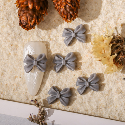 50db Kawaii Bow Resin Nail Art Charm 3D Bowknot Nyári Aranyos Dísz Ékszer Craft Csokornyakkendő Dekorációs Alkatrészek Manikűr 8,5*12,5mm
