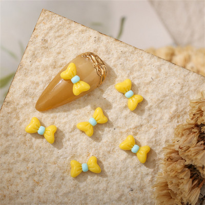 50db Macaron Bow Nail Deco Alkatrészek Mini Elegáns Japán Köröm Gyanta Tartozékok 3D Kawaii Fényes Manikűr Bowknot Charms Ékszer