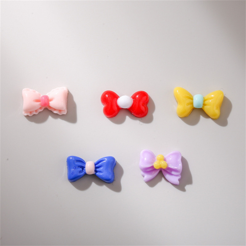 50db Macaron Bow Nail Deco Alkatrészek Mini Elegáns Japán Köröm Gyanta Tartozékok 3D Kawaii Fényes Manikűr Bowknot Charms Ékszer