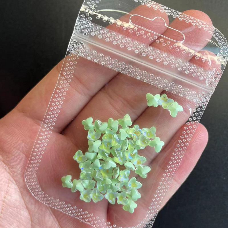 20 kom Mocha Crystal Butterfly Nail Dio 2022 Novi mini privjesci za nokte Sjajno zašiljeno dno dijamantni ukrasi za nokte Dodaci 5 mm