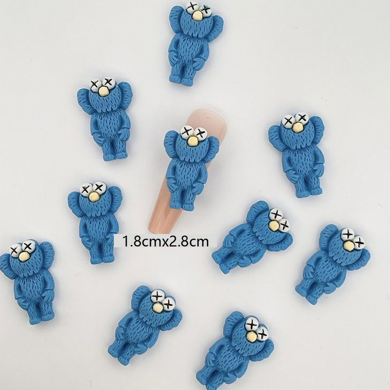 10 DB rajzfilm figurás körömbűvölők, 28x18 mm-es trendi anime baba manikűr, aranyos dekoráció barkács Kawaii körmökhöz / mobiltelefonhoz