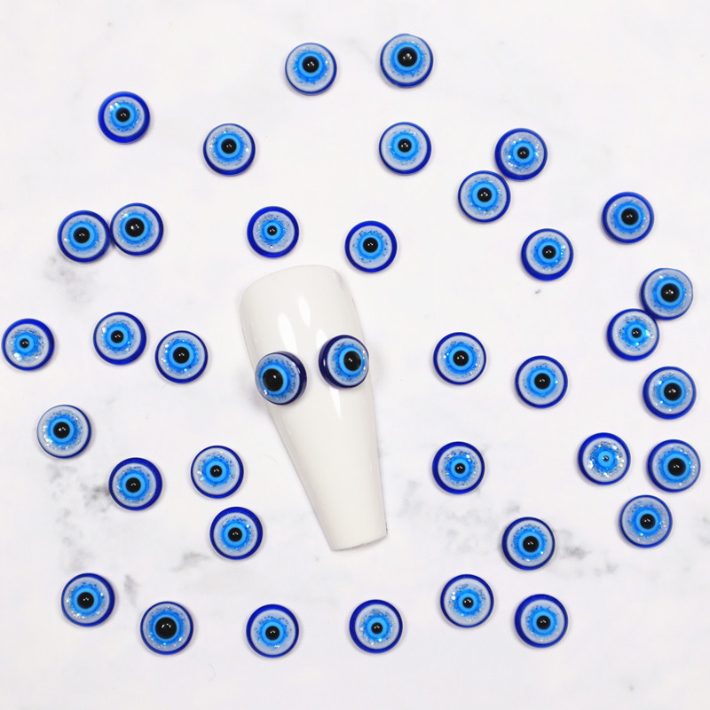 50db/táska Blue Eyes 3D Resin Nail Charms DIY Nail Art Dekorációs Gyöngyök ékszerekhez Köröm Strasszkő Manikűr Kiegészítők 6-8mm