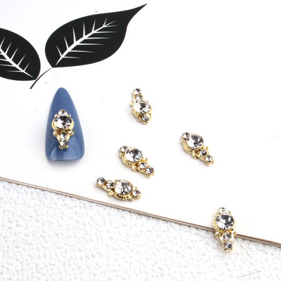 10db Golden Pearl Gems Design Charms Köröm Macskaszem Pillangó Korona Kereszt Dísz Divatos Dangle Maincure Art Charm Medálok J348
