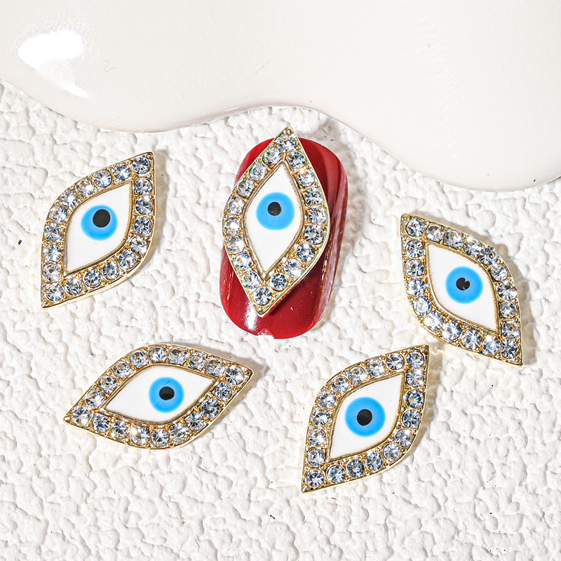10db Evil Eye Nails Art Charms 3D gyémánt berakás széle Blue Eyes ötvözet fém köröm ékszer 9,7*17mm manikűr dekorációs kiegészítő