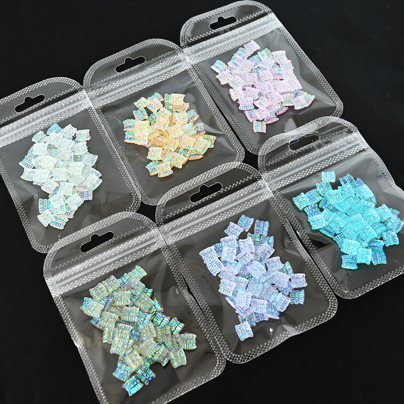 50db 3D Aurora Bowknot strassz művészeti ékszer műgyanta szalagok pillangó virágok minták holografikus manikűr kiegészítők #$4521