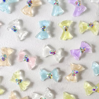 100 бр Cool Summer Elf Jelly Clear Bow Knot Nail Charms Symphony Flashing Elegant Elegant Tie Manicure Adorn Jewel Nailps Аксесоар
