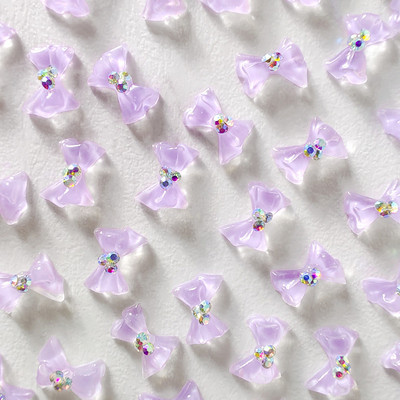 100 vnt Cool Summer Elf Jelly Clear Bow Knot Nagų pakabukai Symphony Mirksintis Elegantiškas peteliškės manikiūras puošia papuošalus nagų galiukų aksesuaras