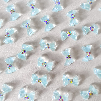 100 vnt Cool Summer Elf Jelly Clear Bow Knot Nagų pakabukai Symphony Mirksintis Elegantiškas peteliškės manikiūras puošia papuošalus nagų galiukų aksesuaras