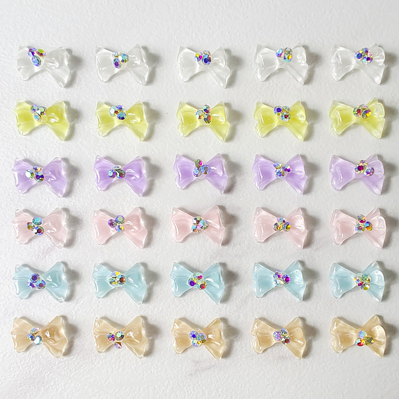 100 vnt Cool Summer Elf Jelly Clear Bow Knot Nagų pakabukai Symphony Mirksintis Elegantiškas peteliškės manikiūras puošia papuošalus nagų galiukų aksesuaras