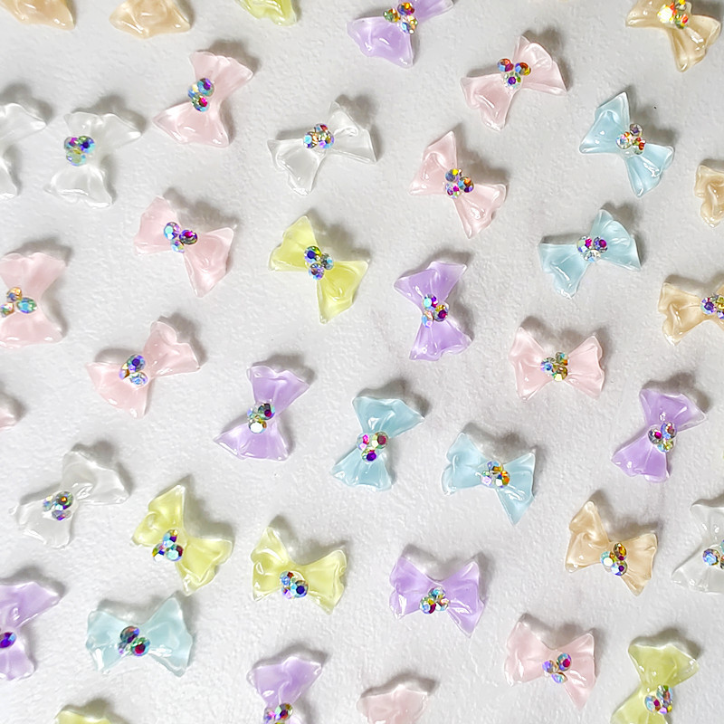 100 vnt Cool Summer Elf Jelly Clear Bow Knot Nagų pakabukai Symphony Mirksintis Elegantiškas peteliškės manikiūras puošia papuošalus nagų galiukų aksesuaras