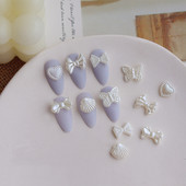 10db Pearl White Nail Resin Charms Barokk Virginal White Csokornyakkendő/Butterfly/Shell Nyári körömdíszítés Barkácsolás Köröm kellékek 11MM