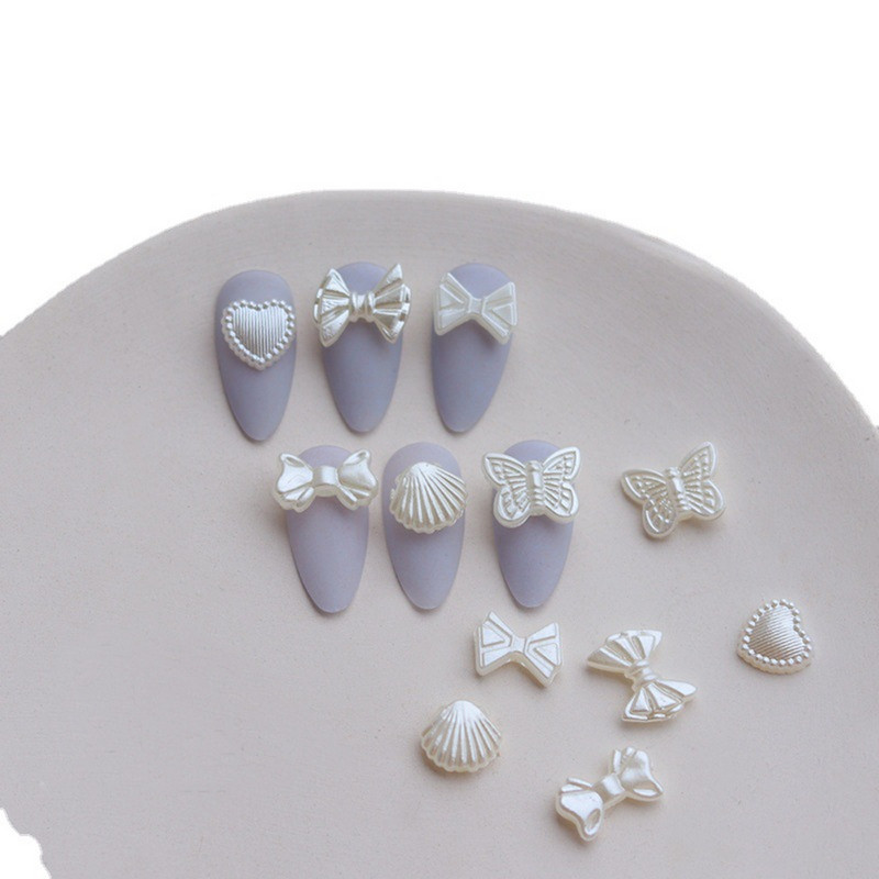 10db Pearl White Nail Resin Charms Barokk Virginal White Csokornyakkendő/Butterfly/Shell Nyári körömdíszítés Barkácsolás Köröm kellékek 11MM